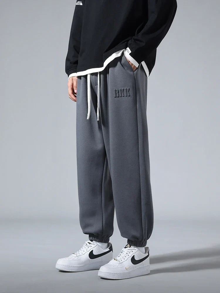 Pantalones jogger de punto hombre entallados con bolsillos amplios