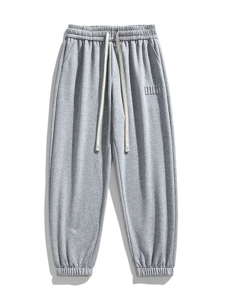 Pantalones jogger de punto hombre entallados con bolsillos amplios