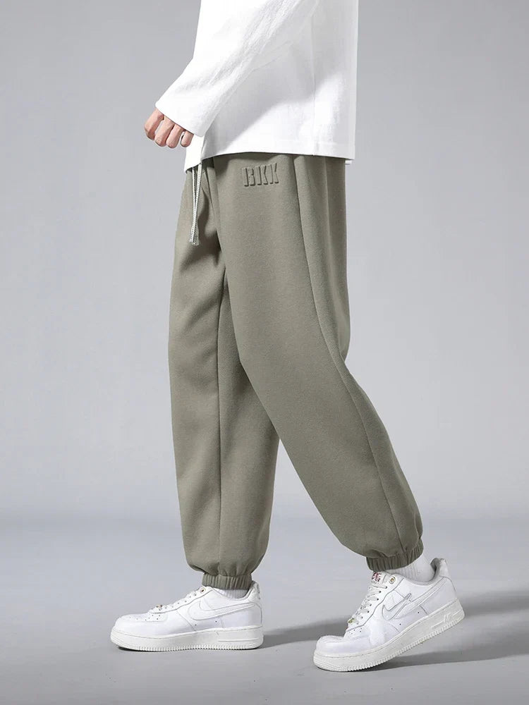 Pantalones jogger de punto hombre entallados con bolsillos amplios