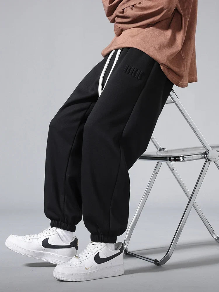 Pantalones jogger de punto hombre entallados con bolsillos amplios