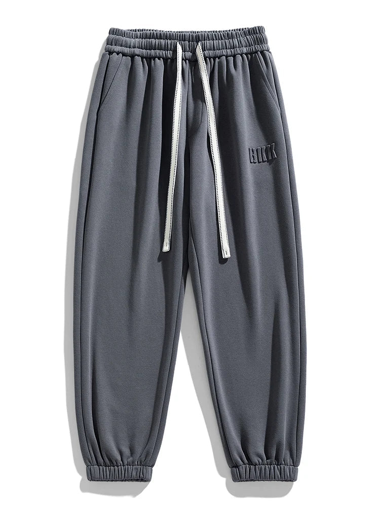 Pantalones jogger de punto hombre entallados con bolsillos amplios