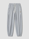 Pantalón jogger hombre con puños elásticos y cordón ajustable