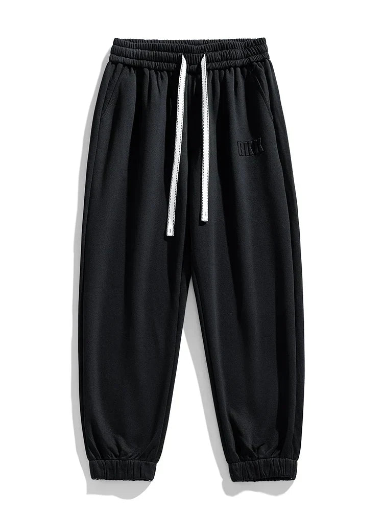 Pantalones jogger de punto hombre entallados con bolsillos amplios