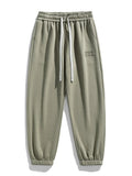 Pantalones jogger de punto hombre entallados con bolsillos amplios