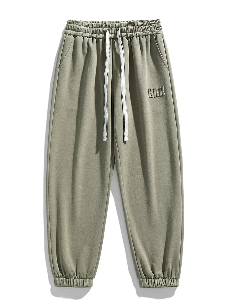 Pantalones jogger de punto hombre entallados con bolsillos amplios